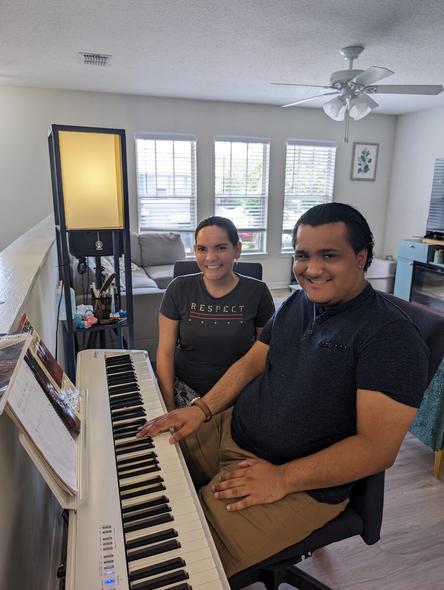 Alejandro during a piano lesson